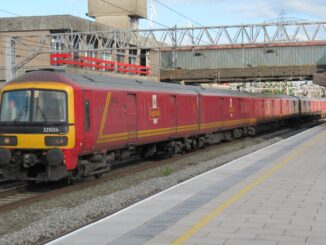 Two young men were arrested inside a mail train and charged with theft